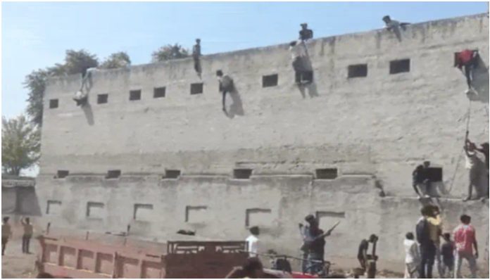 Mass cheating in Haryana board exams, several climb wall to pass chits