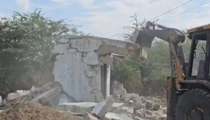 bulldozer on encroachments by father of minor accused