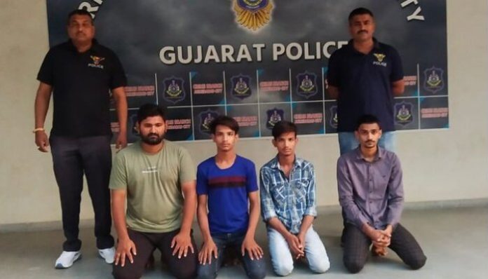 The accused with the police.