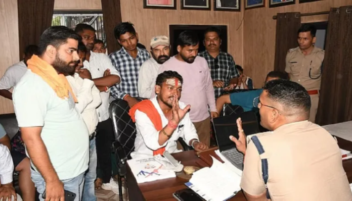 Members of Hindu groups talking to the police.