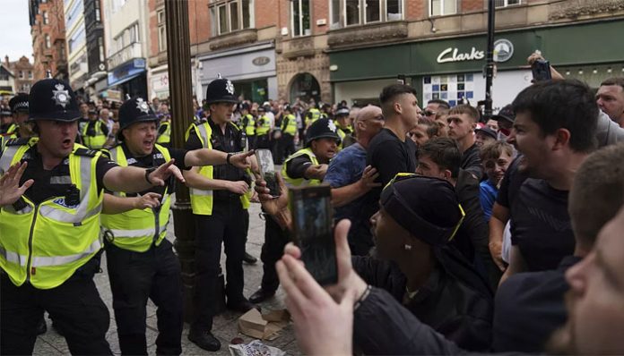 Anti-immigrant protests erupted in the UK following death of three young girls in a stabbing incident