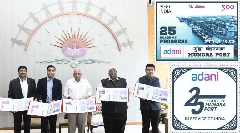 Gujarat CM Bhupendra Patel unveils India Post’s commemorative stamp marking 25 years of Adani Group’s Mundra Port