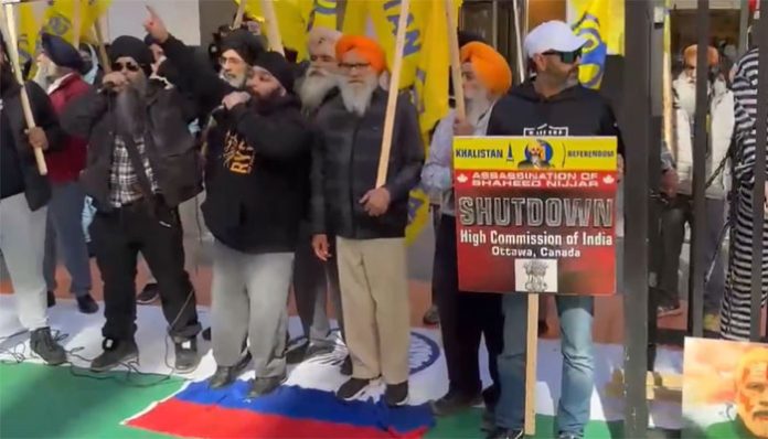 Pro-Khalistani Sikhs desecrating Indian flag and attacking Modi effigy in Toronto