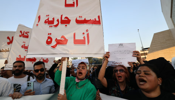 Iraqis protest against underage marriage in Baghdad.