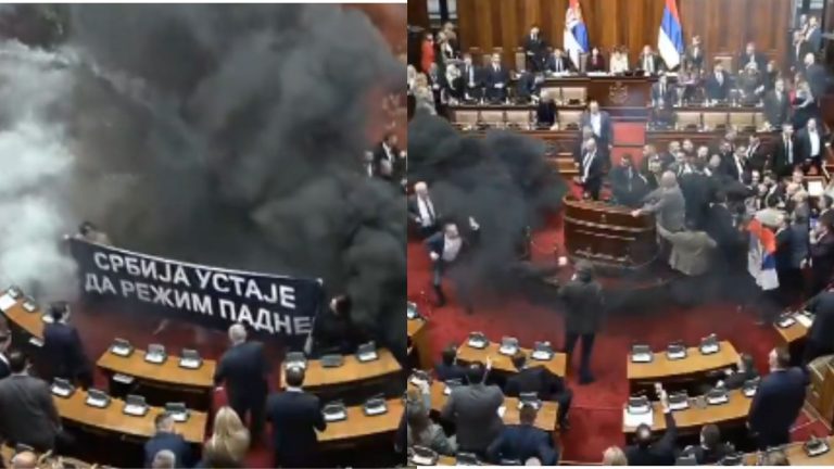 Serbian Parliament witnesses chaotic scenes as opposition politicians hurl smoke grenades and tear gas inside the house, several politicians injured