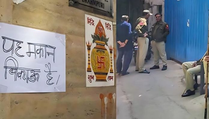 Hindu families in Brahmpuri put up 'house for sale' posters amid tension over mosque expansion.