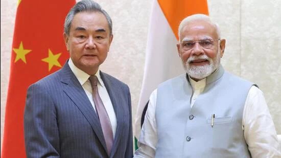 Wang yi PM Modi