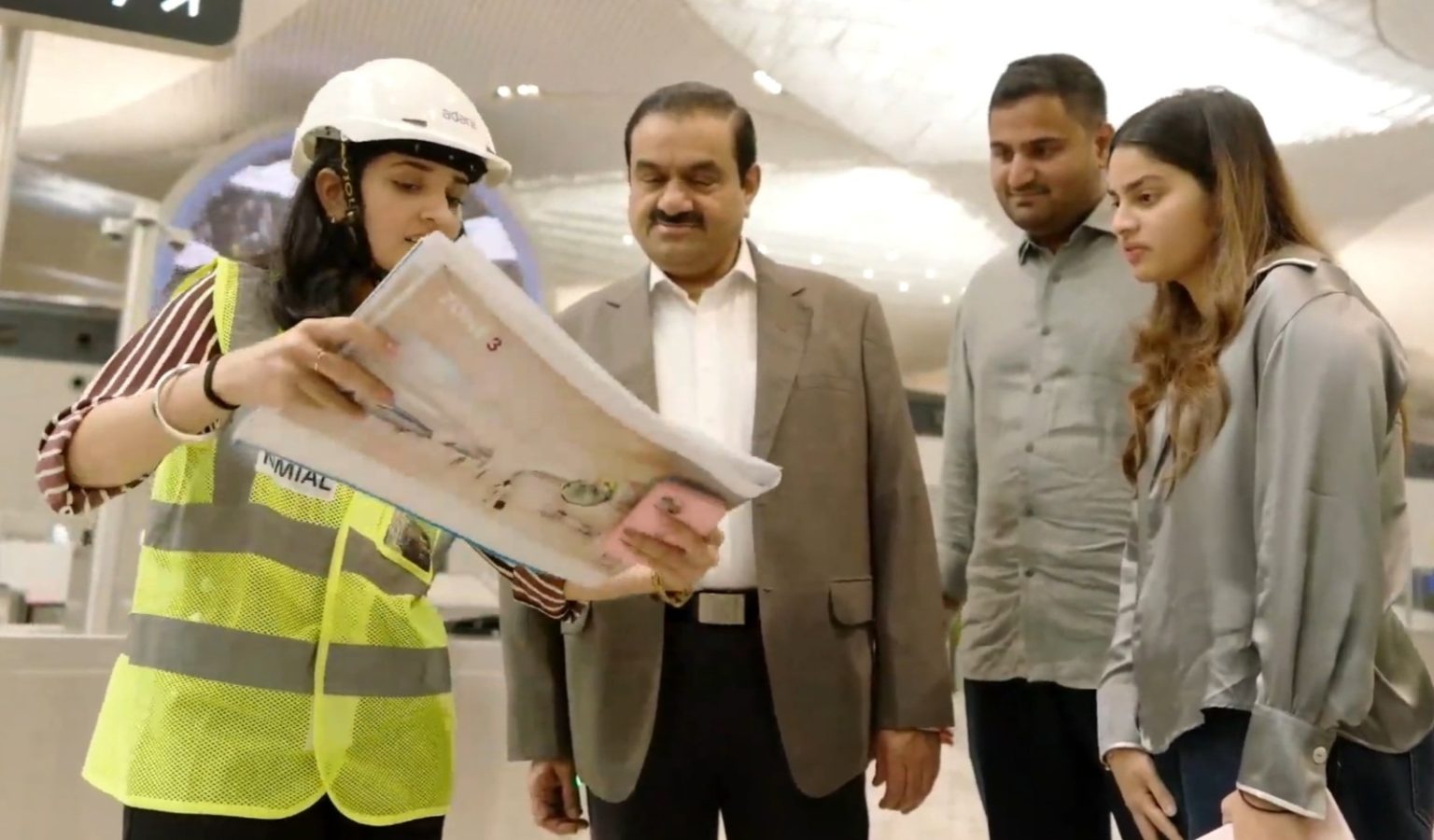 Gautam Adani meets workers who built the Navi Mumbai Airport ahead of 8 ...
