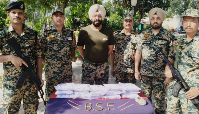 BSF personnel patrol India-Pakistan border in Punjab to prevent drug smuggling and cross-border intrusions.