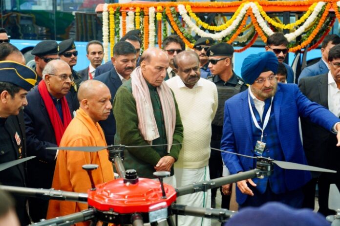 Defence Minister Rajnath Singh, UP CM Yogi and Union Minister for Heavy Industries HD Kumaraswamy at inauguration of Ashok Leyland's EV plant in Lucknow