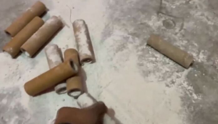 Police display seized explosives and equipment recovered from illegal firecracker unit in Fatehpur village