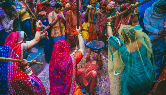 9 people were charged by Mathura Police with attempting to harm the reputation of prominent Lathmar and Laddumar Holi.