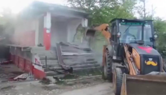 Anantnag police demolished illegal properties belonging to a local drug peddler.