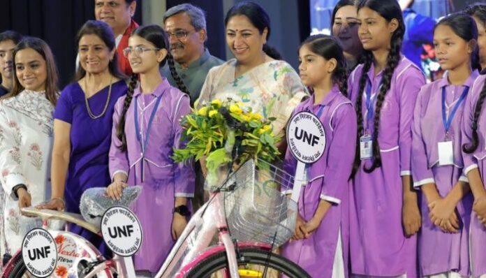 Delhi Chief Minister Rekha Gupta attended a Mann Ki Baat listening programme in Malviya Nagar and distributed bicycles to 15 underprivileged girl students.
