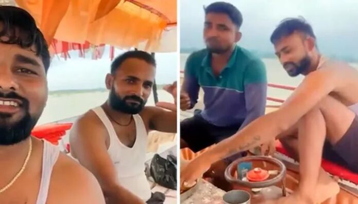 Ayodhya Police have detained three men after a viral video showed four people eating mutton and drinking beer on a boat in the middle of the Saryu River near Guptar Ghat. Ayodhya Police have detained three men after a viral video showed four people eating mutton and drinking beer on a boat in the middle of the Saryu River near Guptar Ghat.