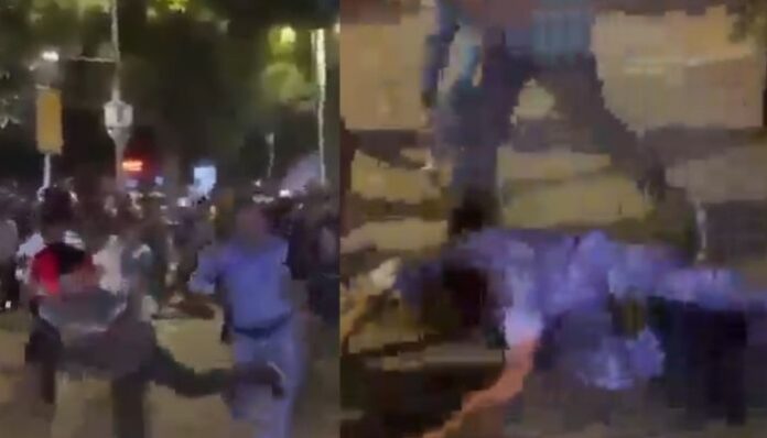 Nihangs armed with swords attack police and RAF personnel during the violent CJP protest in Delhi.